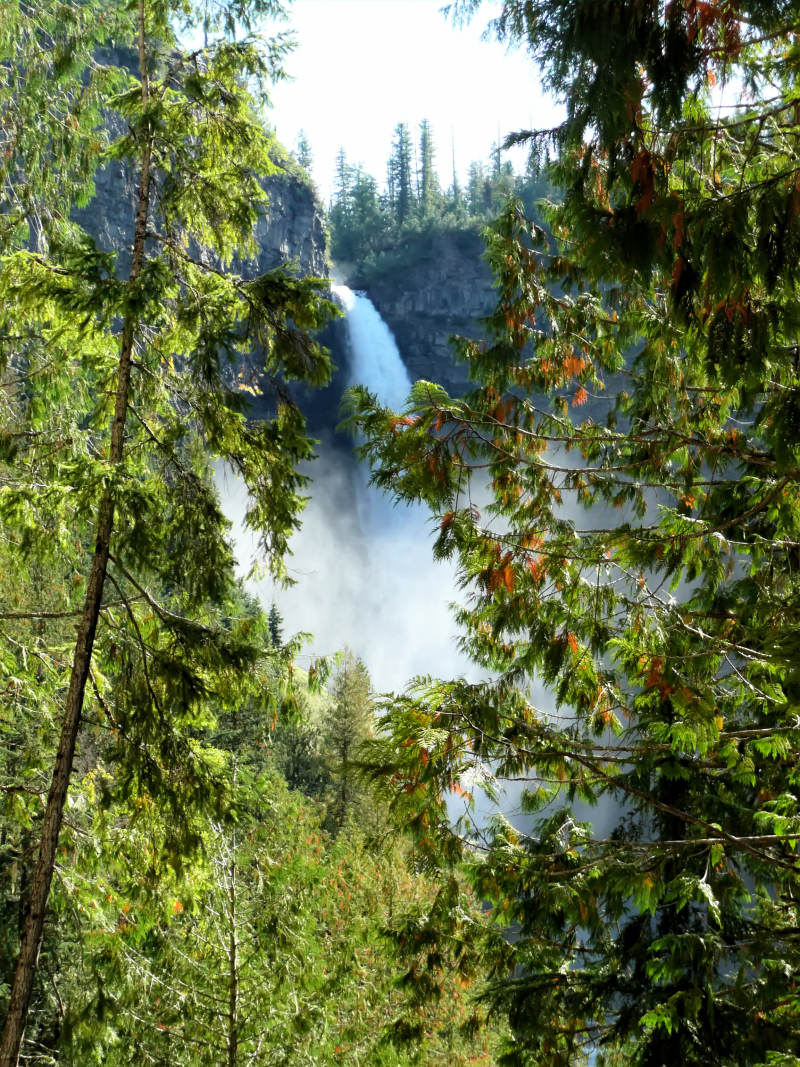 A first view of Helmcken Falls from inside the canyon